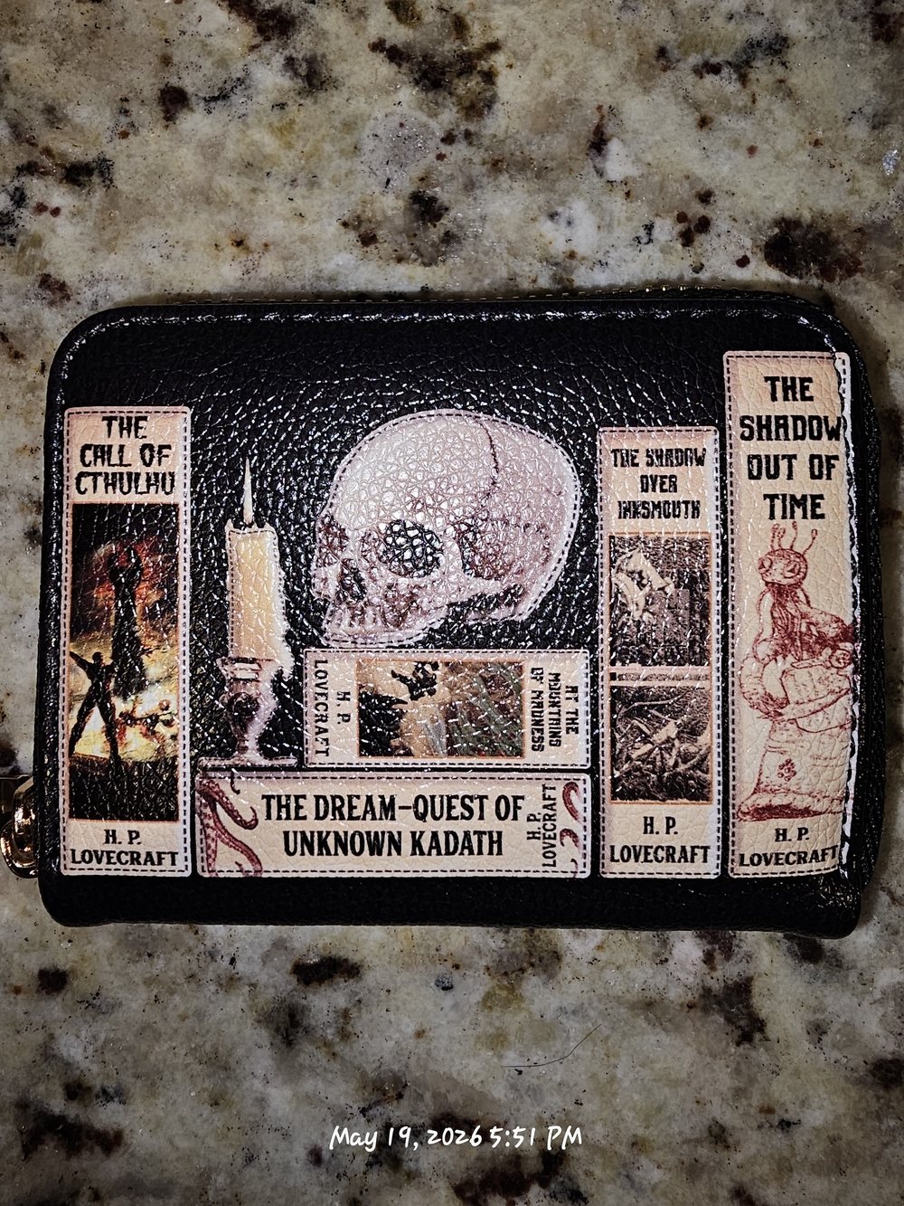 Lettoria Lovecraftian themed black wallet featuring various classic book covers